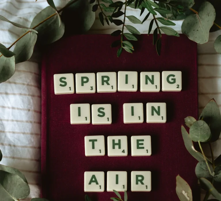 Spring is in the air spelled out in letter tiles, a seasonal home refresh in Tauranga
